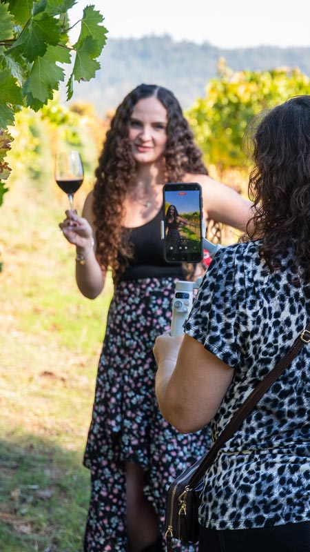 Woman posing with wine