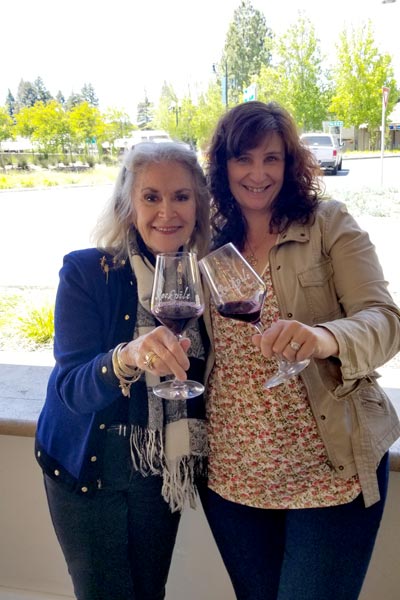 Women toasting with wine